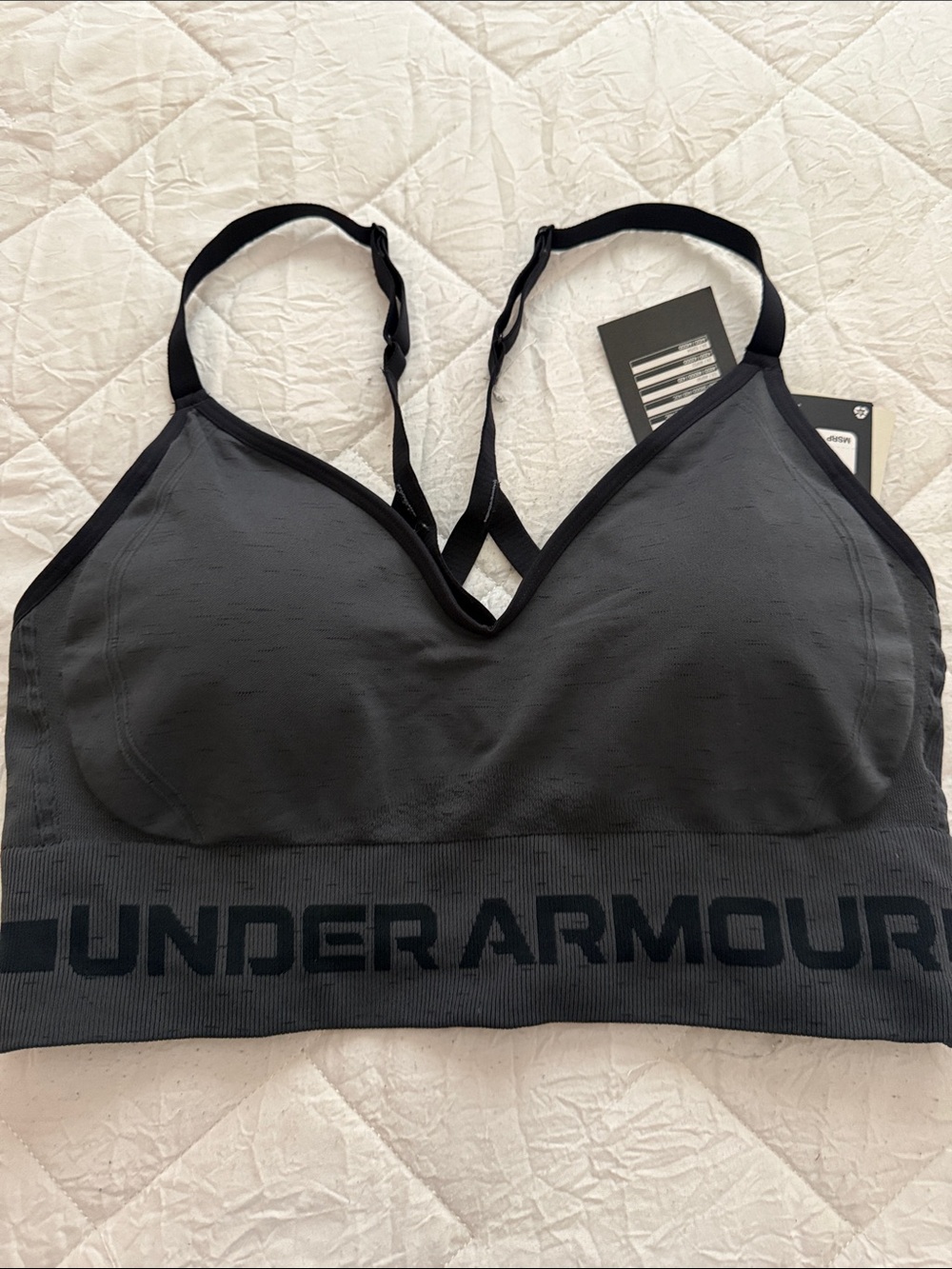 Under Armour Women's Charcoal Gray Seamless Sports Bra with Black Lettering